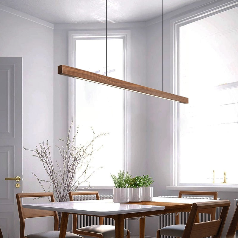 Lights of Scandinavia - Lindö - Modern long hanging dining room pendant light ala Nordic style. Will also make a good fit for office areas, restaurants and bars. Pine wood or black walnut Use the included remote to change color temperature between cold, neutral and warm light.